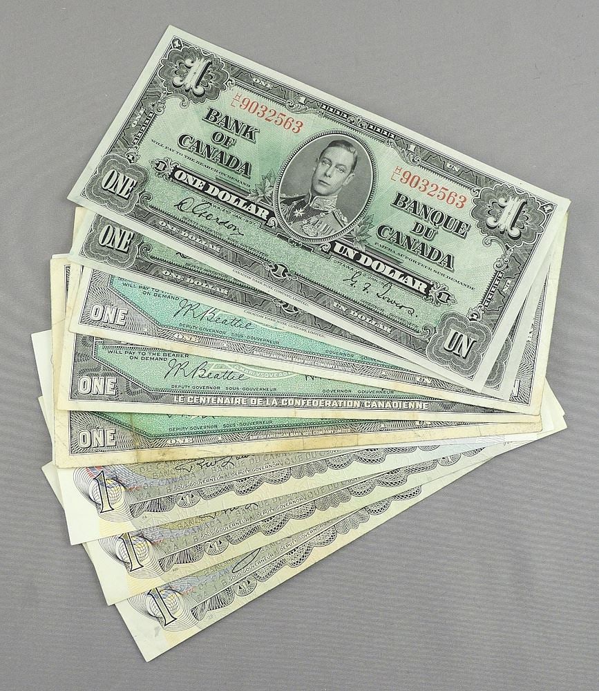 26 x Cdn $1 Coins/3 x Cdn $2 Coins/ 5 x USA $1 Coins. (1 of 3)