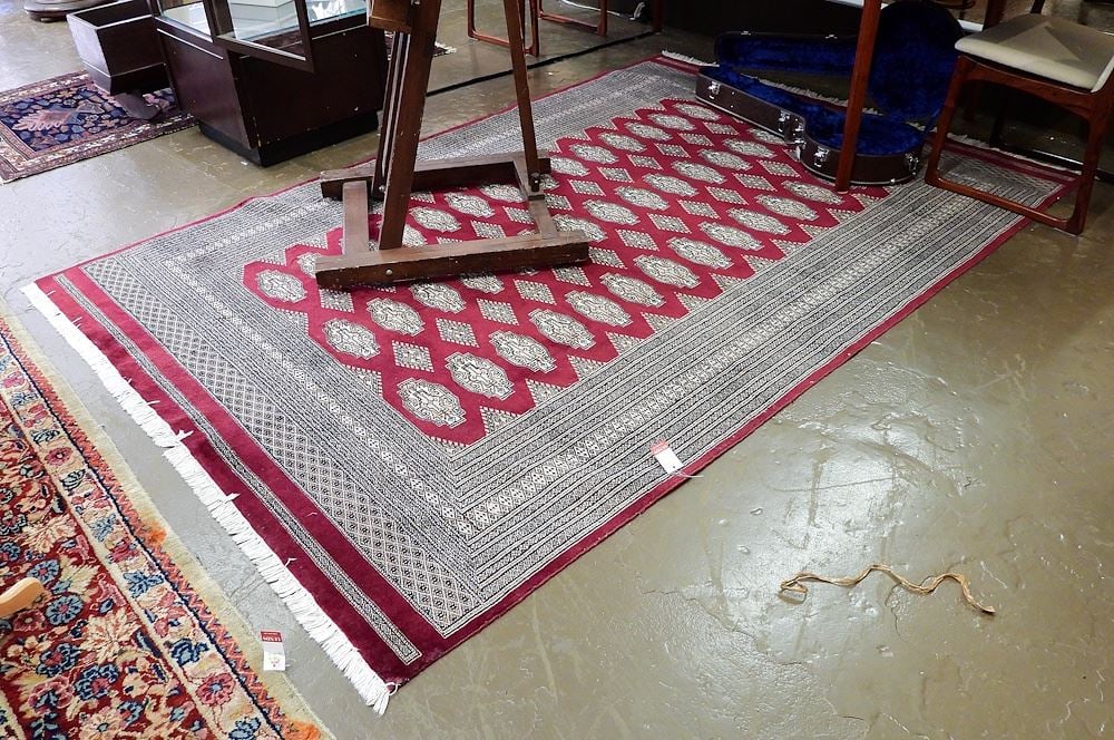 Hand Knotted Bokhara Carpet Approximately 6'2" x 9'5". (1 of 5)
