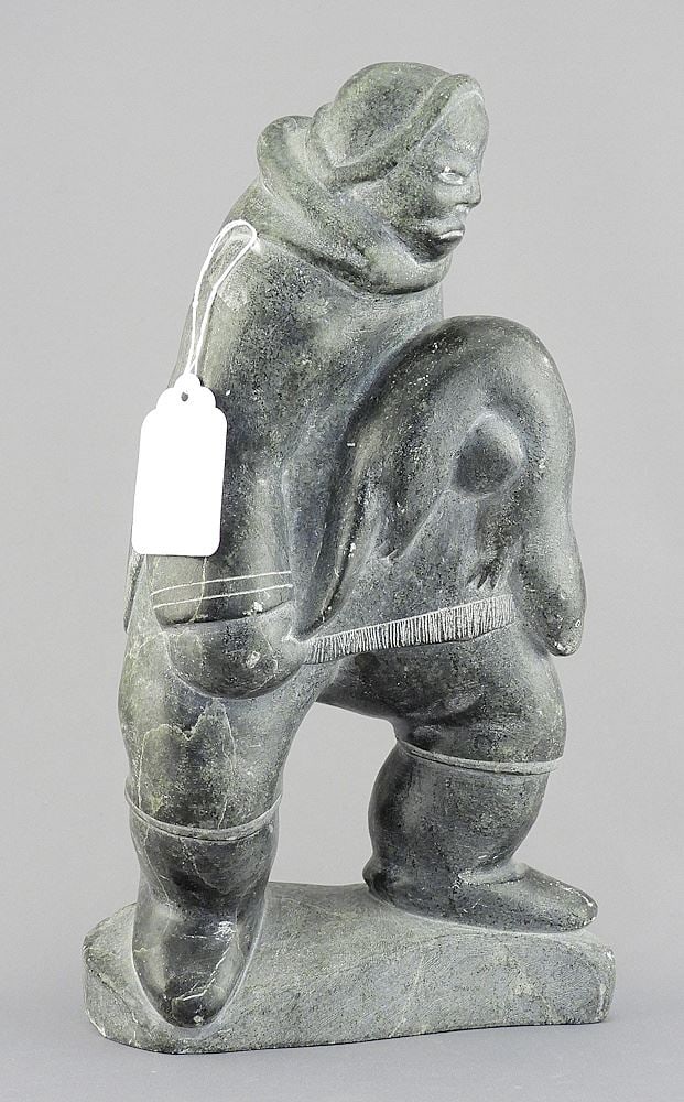 Inuit Stone Figure signed Abraham, 10 1/2"h "Man w/Otter". (1 of 3)