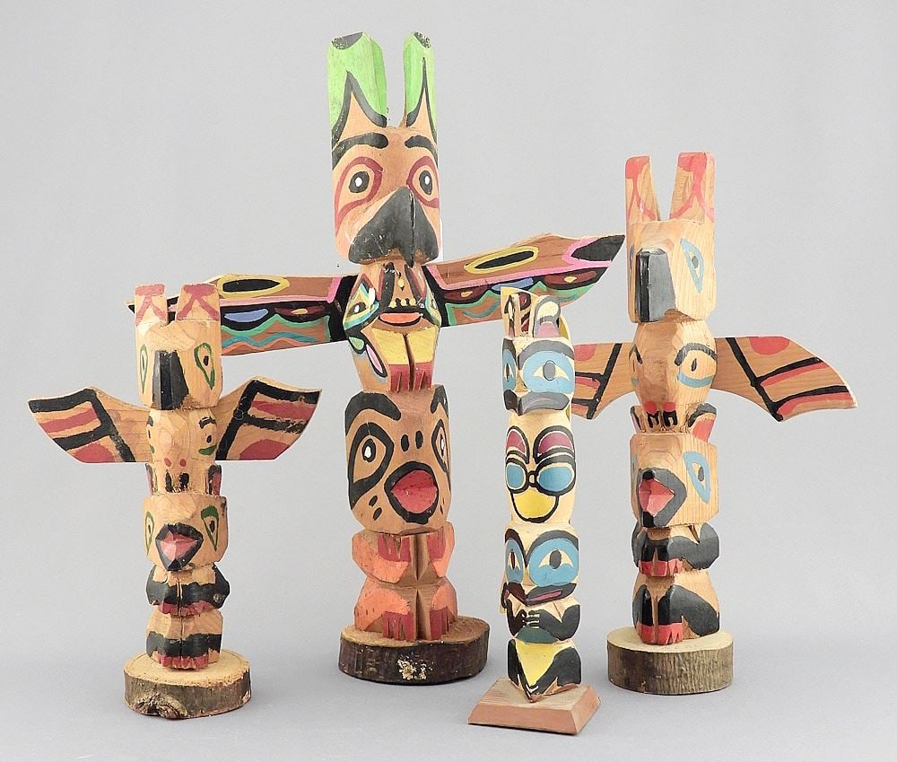 Four Model Totem Poles, 6 1/4 - 10 5/8"h. (1 of 3)