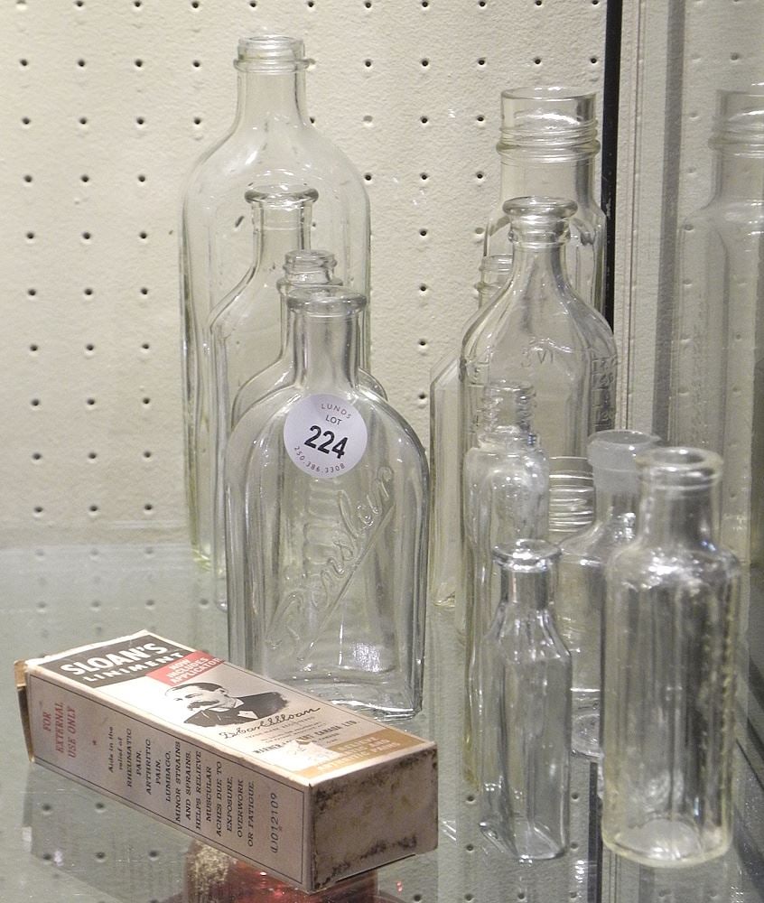Collection of Vintage Clear Glass Bottles Including Sloan's Linament.: Collection of Vintage Clear Glass Bottles Including Sloan's Linament.