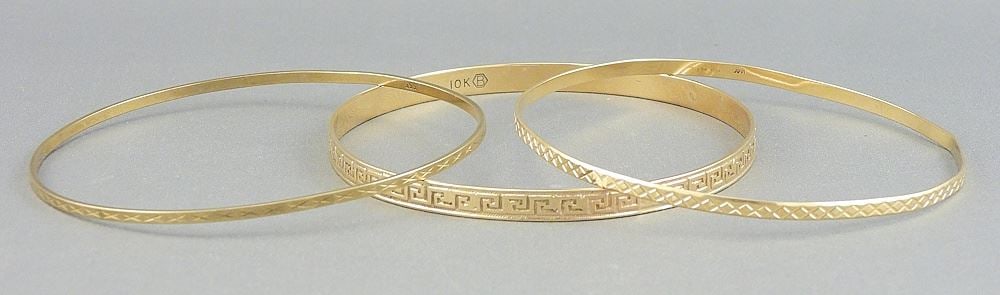 3 Gold Bangles; 10K 9.30 grams, 18K 5.31 grams and 8K 4.94 grams. (1 of 3)