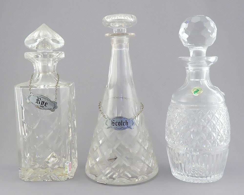Three Crystal Decanters (1 Waterford), 10 - 10 3/4"h.: Three Crystal Decanters (1 Waterford), 10 - 10 3/4"h.