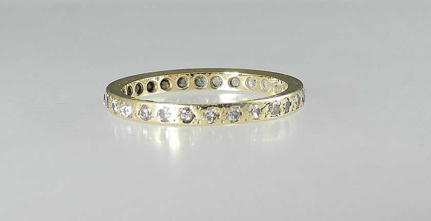 18Kt (marked) 28 Diamond Gold Eternity Band, Size 6 1/4, 2.1g. (1 of 2)
