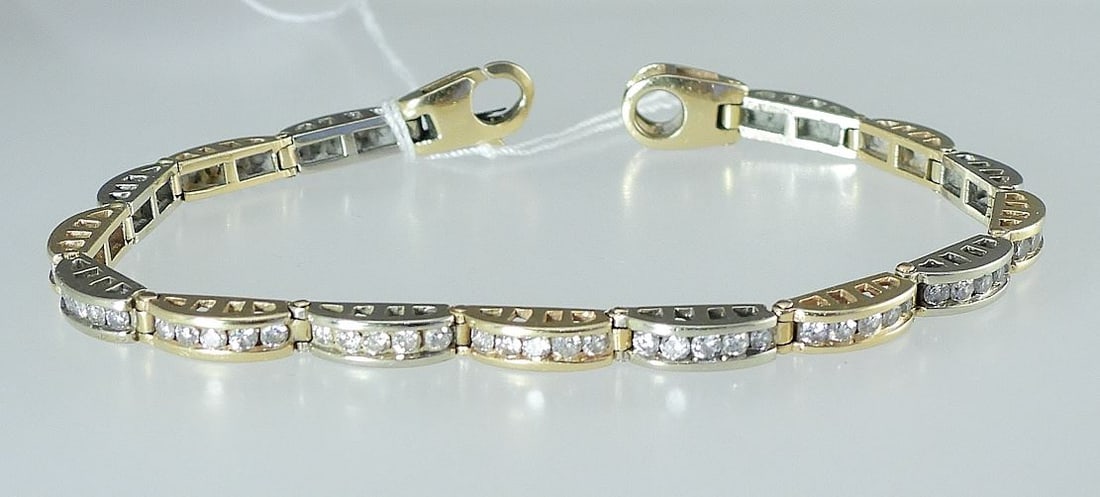 14K Gold and Diamond 7" Bracelet, 14.30 grams.: 14K Gold and Diamond 7" Bracelet, 14.30 grams.