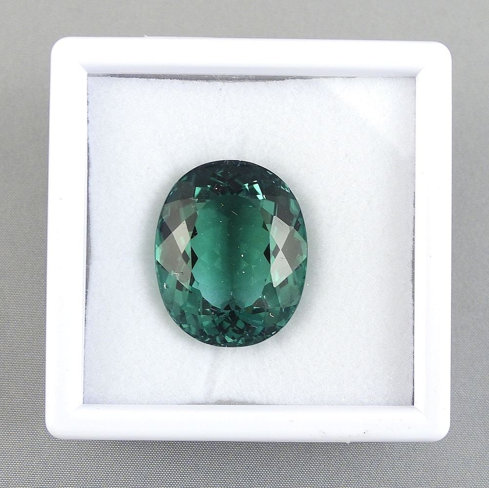 36.6ct Oval Modified Brilliant Cut Greened Amethyst w/Appraisal 1024.: 36.6ct Oval Modified Brilliant Cut Greened Amethyst w/Appraisal 1024.