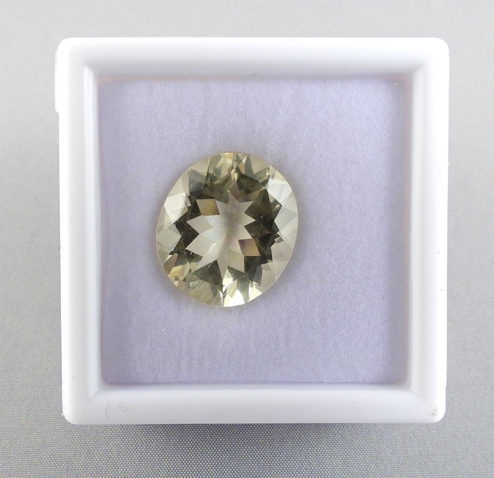 12.67ct Oval Modified Brilliant Cut Golden Beryl w/Appraisal 1019.: 12.67ct Oval Modified Brilliant Cut Golden Beryl w/Appraisal 1019.