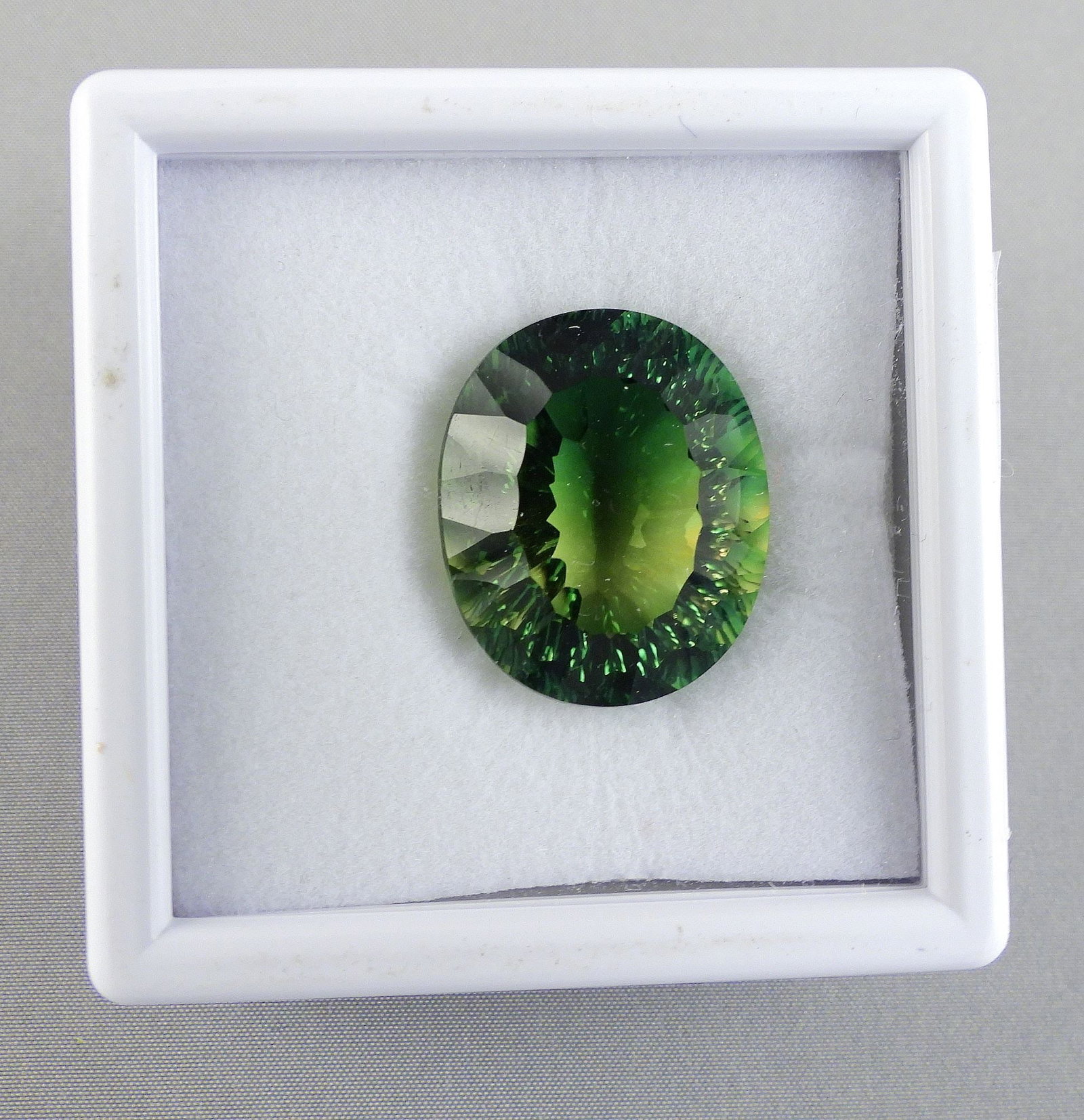 32.05ct Oval Mixed Cut Bi-Colour Quartz w/Appraisal 1039.: 32.05ct Oval Mixed Cut Bi-Colour Quartz w/Appraisal 1039.