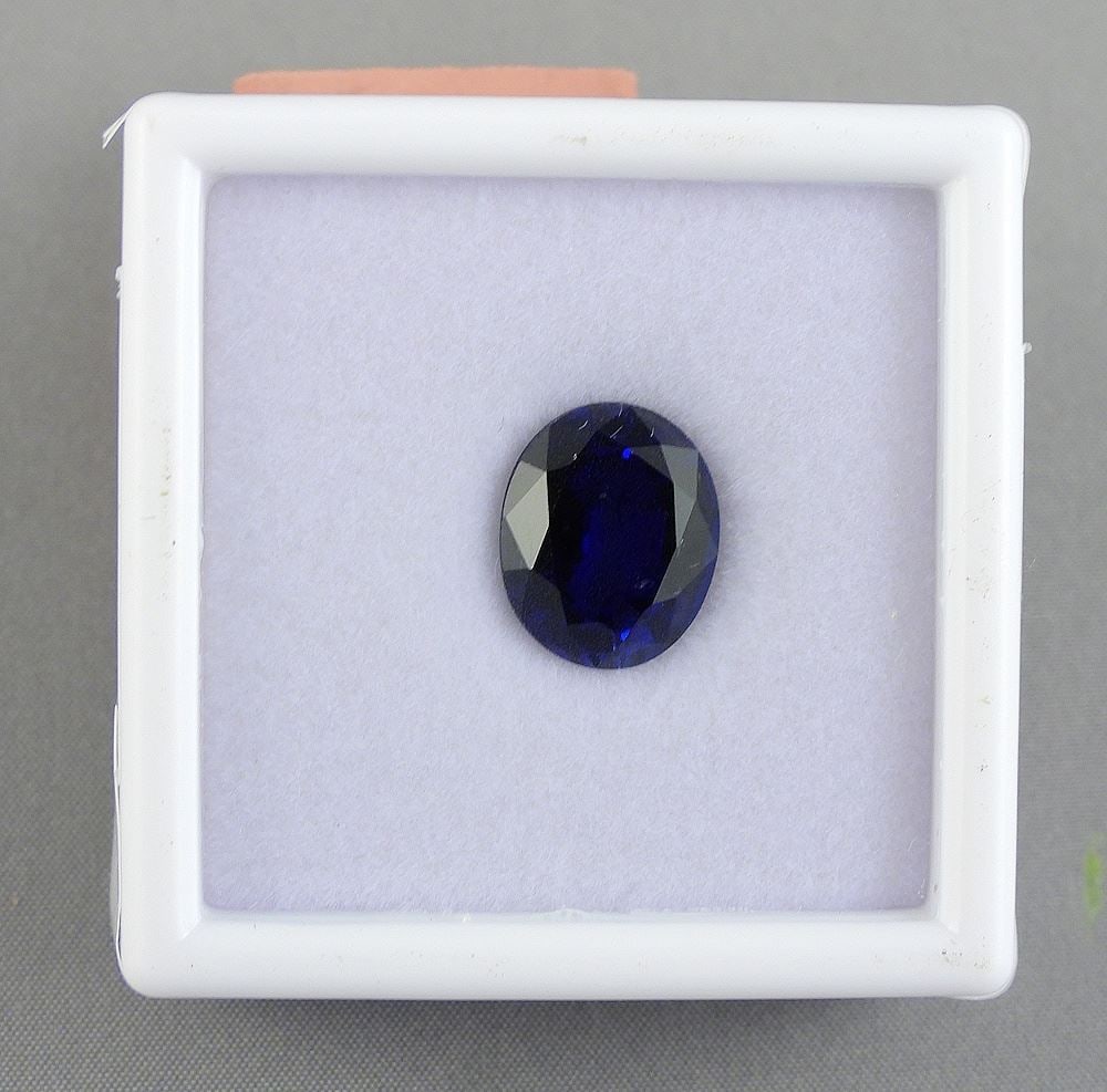 6.63ct Oval Mixed Cut Synthetic Blue Sapphire w/Appraisal 1035.: 6.63ct Oval Mixed Cut Synthetic Blue Sapphire w/Appraisal 1035.
