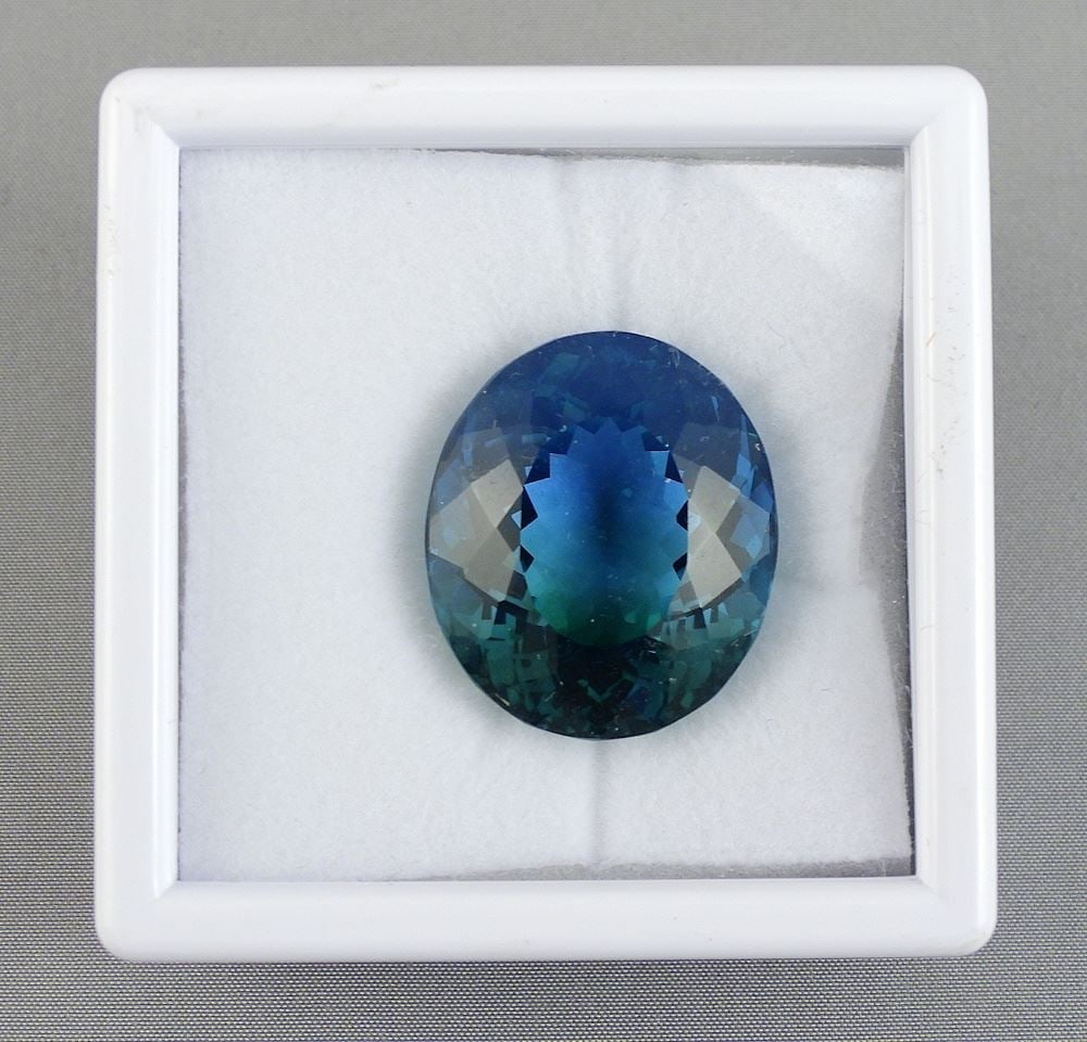 39.81ct Oval Modified Mixed Cut Bi-Colour Quartz w/Appraisal 1042.: 39.81ct Oval Modified Mixed Cut Bi-Colour Quartz w/Appraisal 1042.
