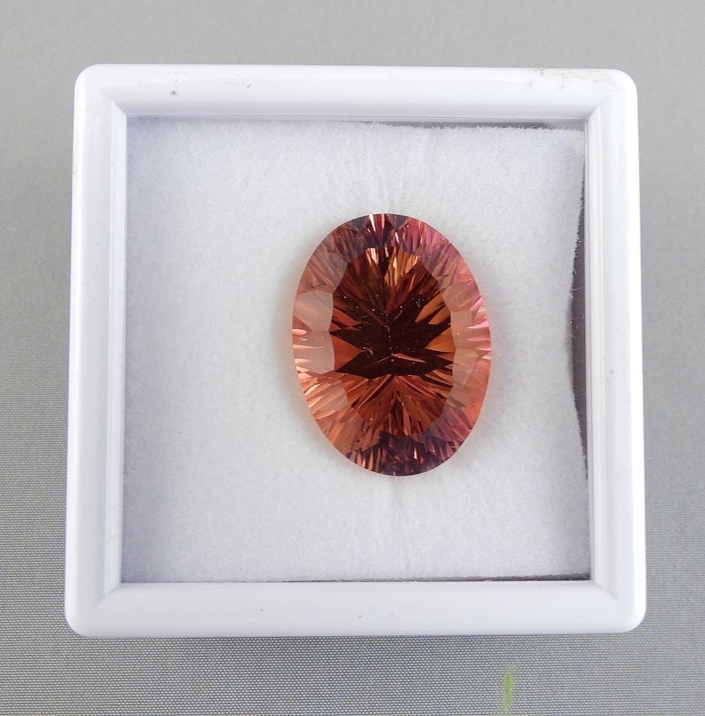 30.56ct Oval Mixed Cut Madeira Quartz w/Appraisal 1041.: 30.56ct Oval Mixed Cut Madeira Quartz w/Appraisal 1041.