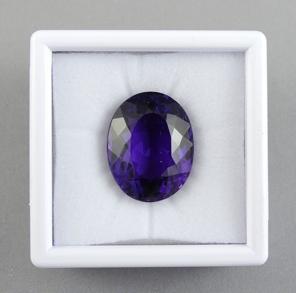 36.44ct Oval Brilliant Cut Amethyst w/Appraisal 1025.: 36.44ct Oval Brilliant Cut Amethyst w/Appraisal 1025.