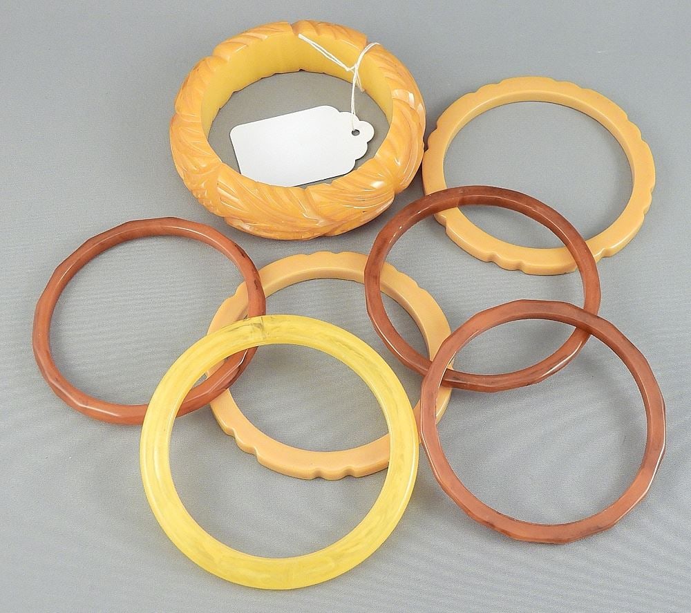7 Vintage Butterscotch Bakelite Single Carved Bangles (1 pair / set of 3). (1 of 2)
