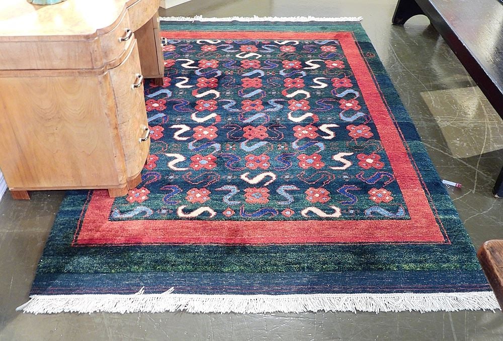 Hand Knotted Wool Carpet w/Repeating Floral Motif, Approximately 4'11" x 7'6".: Hand Knotted Wool Carpet w/Repeating Floral Motif, Approximately 4'11" x 7'6".