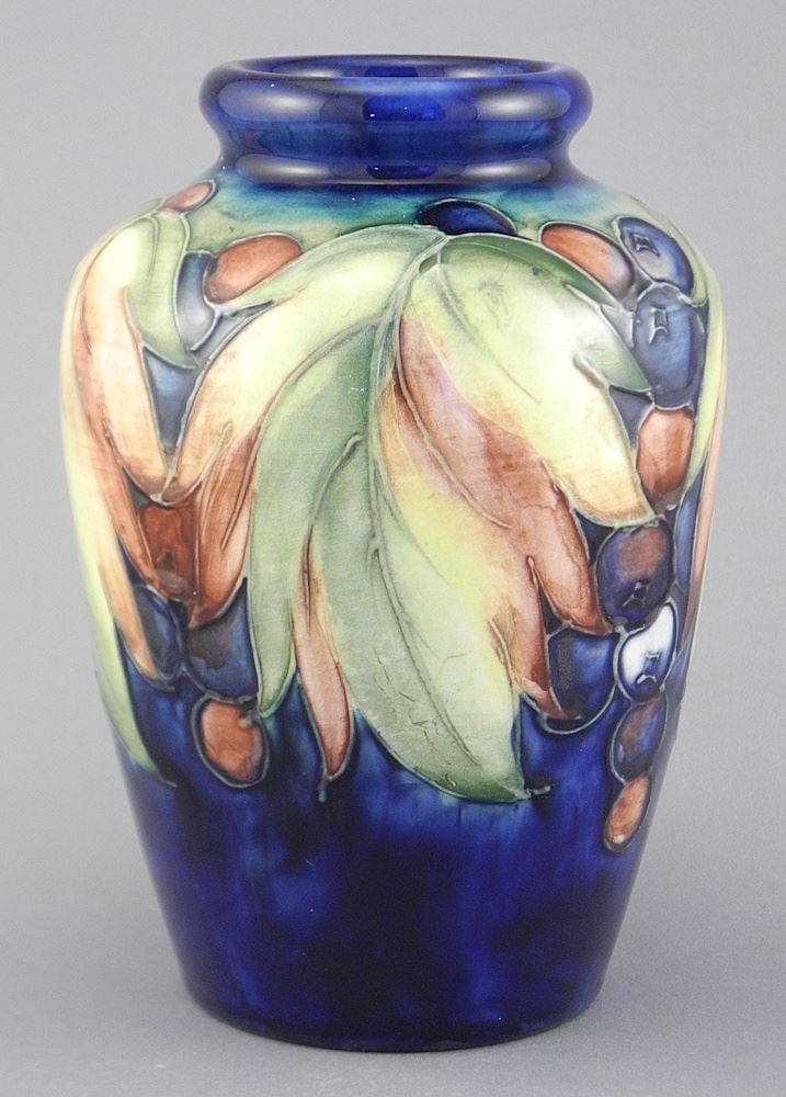 Moorcroft Leaf & Berry Vase, 5 7/8"h (glaze spur foot rim noted). (1 of 3)