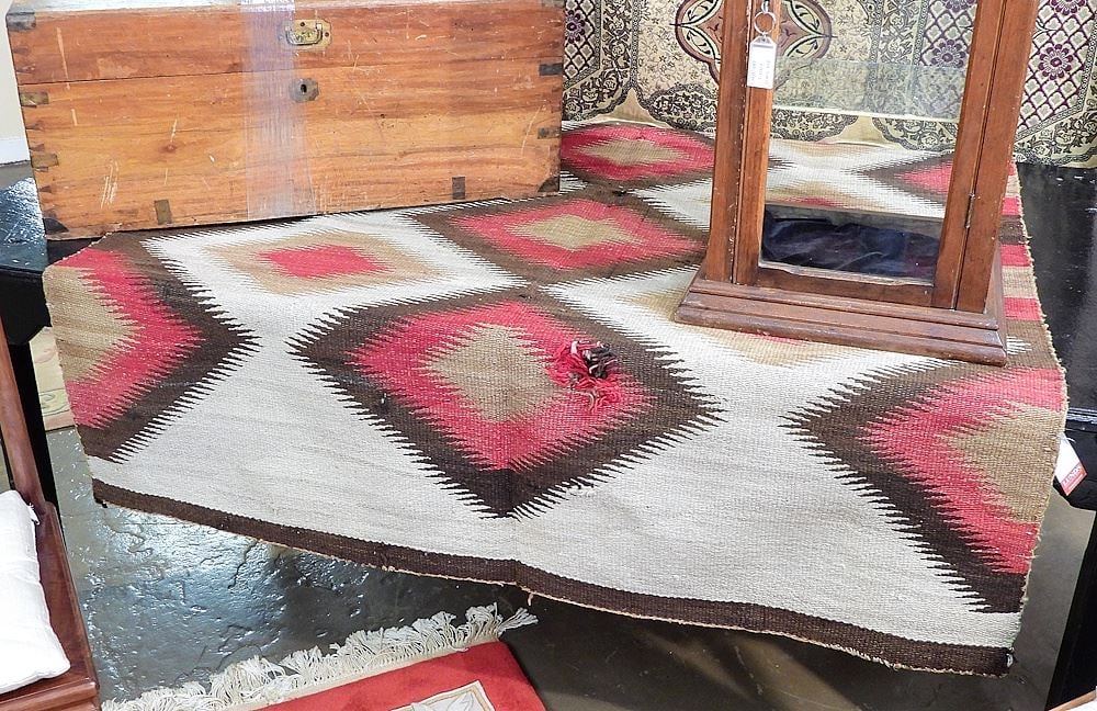 Navajo Rug, Approximately 60 x 51" (as found/condition noted).: Navajo Rug, Approximately 60 x 51" (as found/condition noted).
