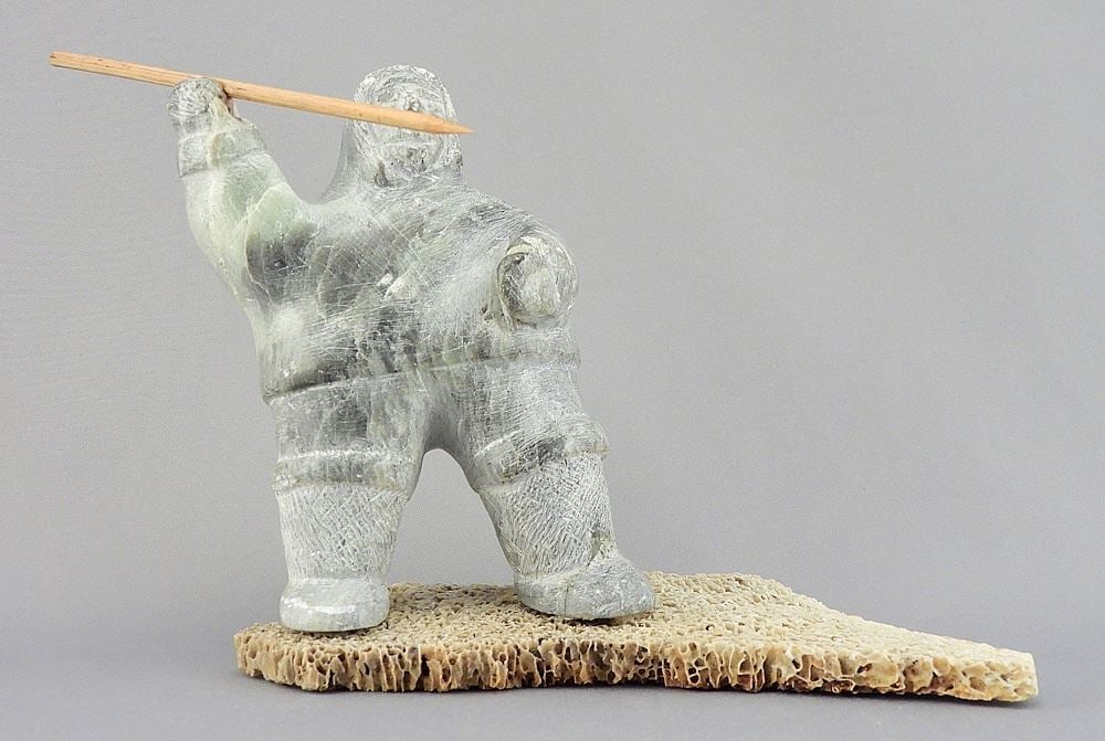 Inuit Stone Hunter on Whale Bone, 4 1/2"h, CANADIAN BIDDERS ONLY. (1 of 3)