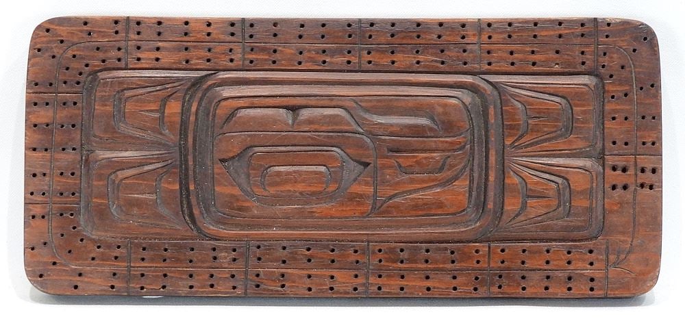 Kwagiulth Carved Cedar Cribbage Board signed Larry Jacobson, 14"L. (1 of 2)