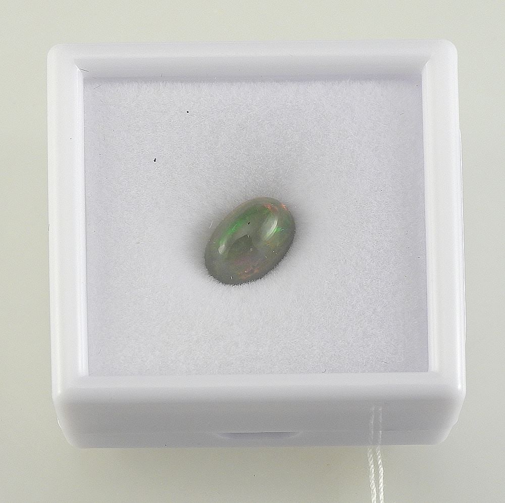 2.5ct Natural Black Opal, Untreated, Oval Cabochon.: 2.5ct Natural Black Opal, Untreated, Oval Cabochon.
