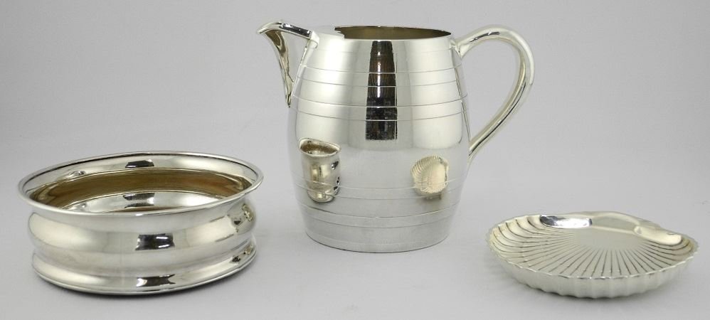 Sterling Scallop Shell, plated bottle coaster and water: Sterling Scallop Shell, plated bottle coaster and water pitcher.