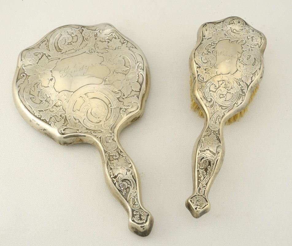 Sterling Silver Dresser Mirror and Matching Brush. (1 of 2)