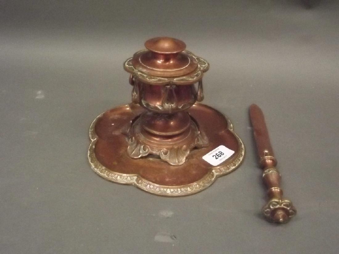 A C19th Arts & Crafts coppered brass inkwell and letter: A C19th Arts & Crafts coppered brass inkwell and letter opener, engraved 'Powderham Castle, Exeter', 8" x 5"