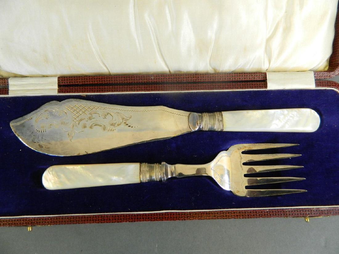 A cased pair of silver plated fish servers with Mother (1 of 2)