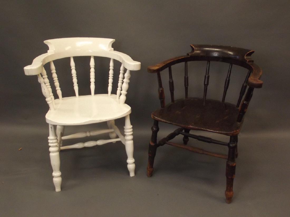 A Victorian elm smoker's bow elbow chair, and another: A Victorian elm smoker's bow elbow chair, and another similar but painted