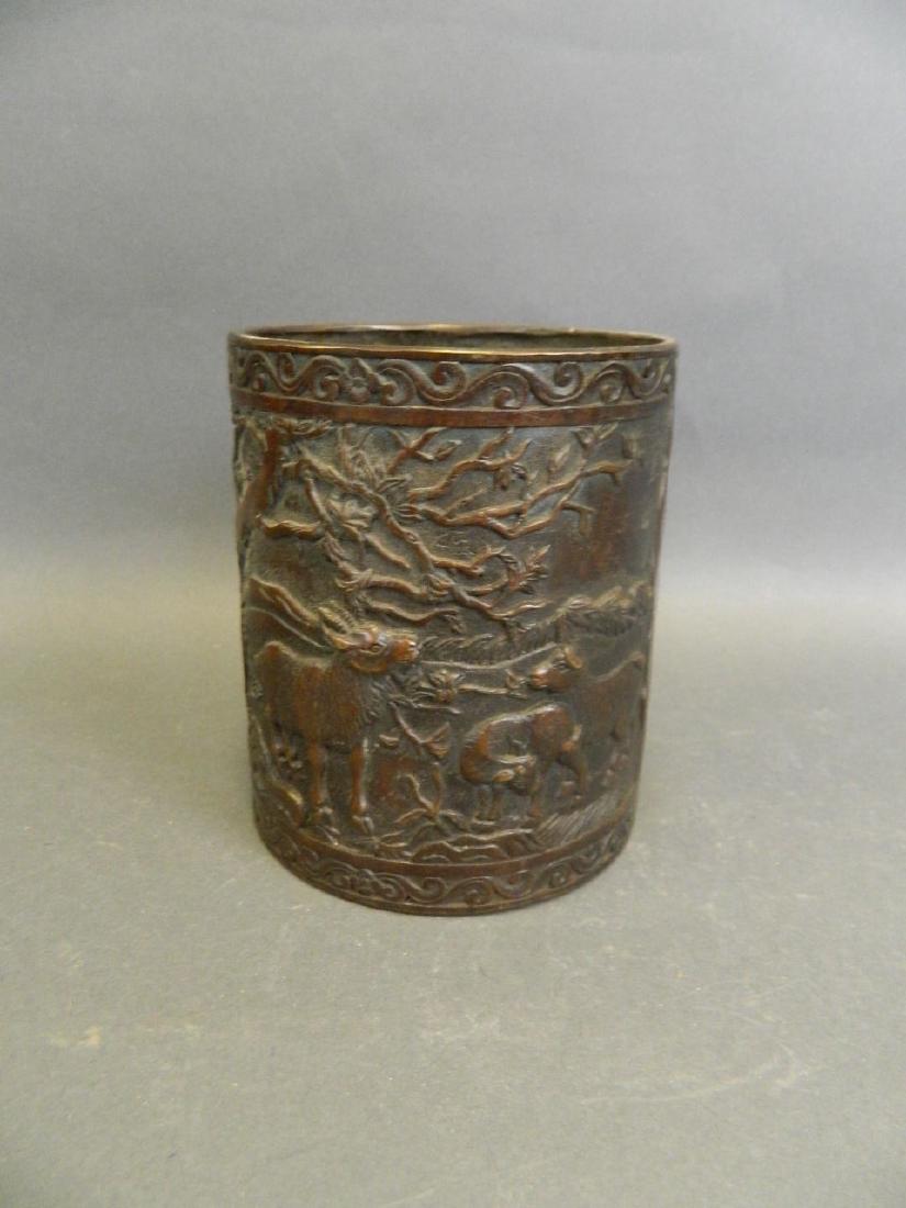 A Chinese bronze brush pot with relief decoration of (1 of 6)