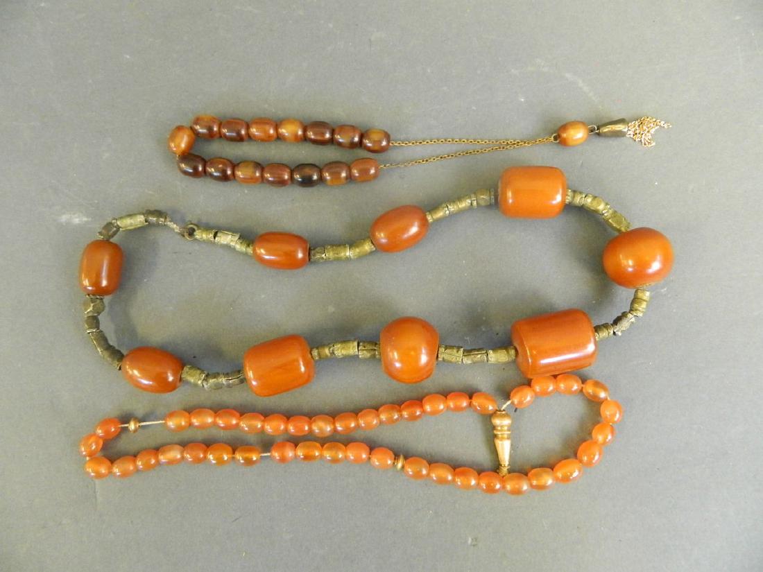 An Ethnic amber and metal bead necklace, together with (1 of 1)