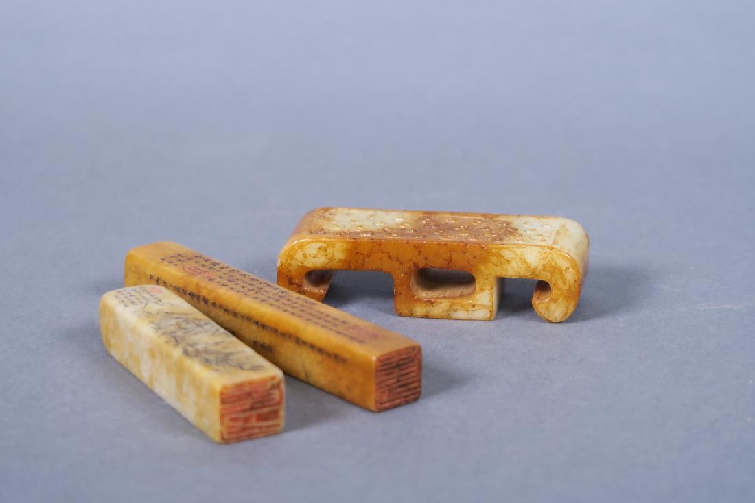 A Chinese soapstone brush rest, together with two (1 of 2)