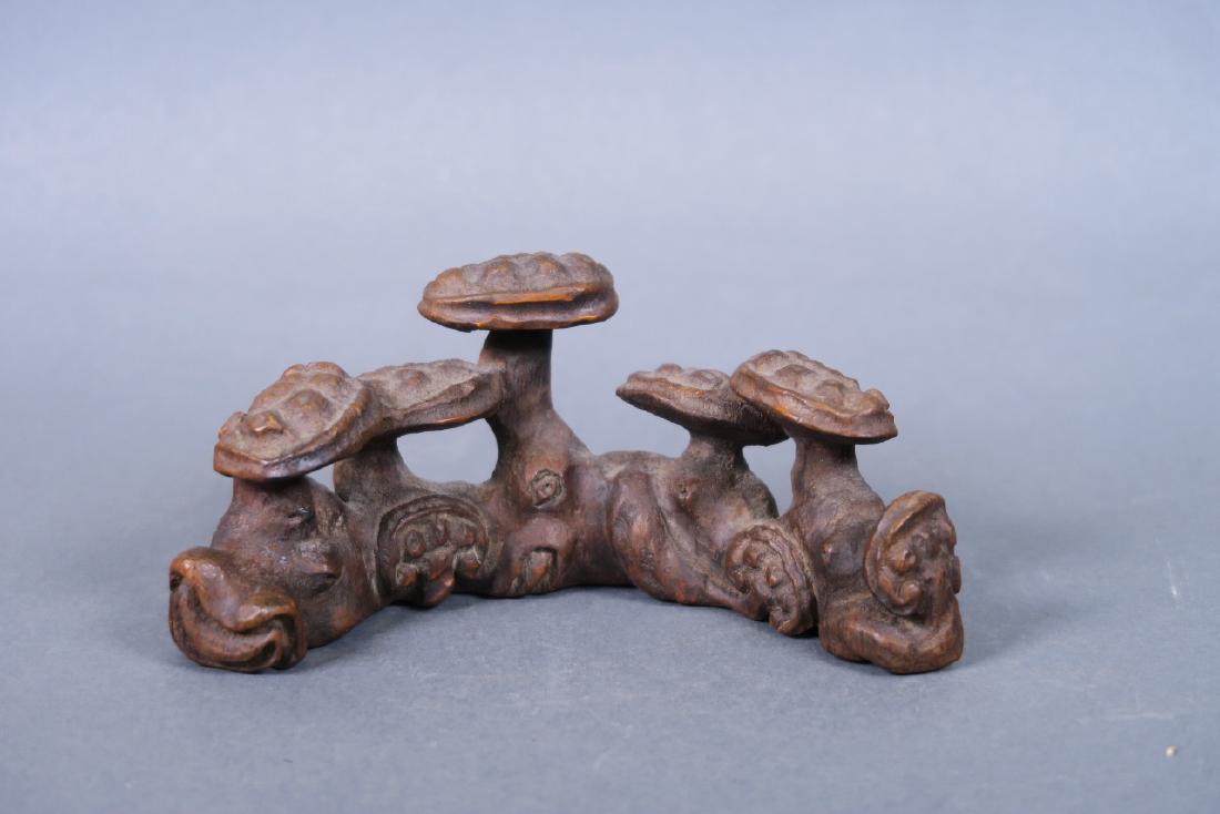 A Chinese carved bamboo brush rest in the form of tree (1 of 1)