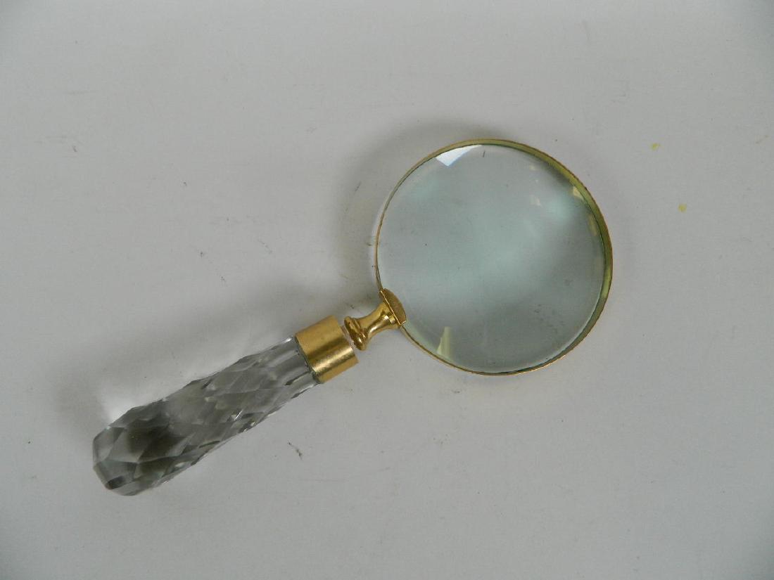 A brass bound magnifying glass with glass handle, 9": A brass bound magnifying glass with glass handle, 9" long
