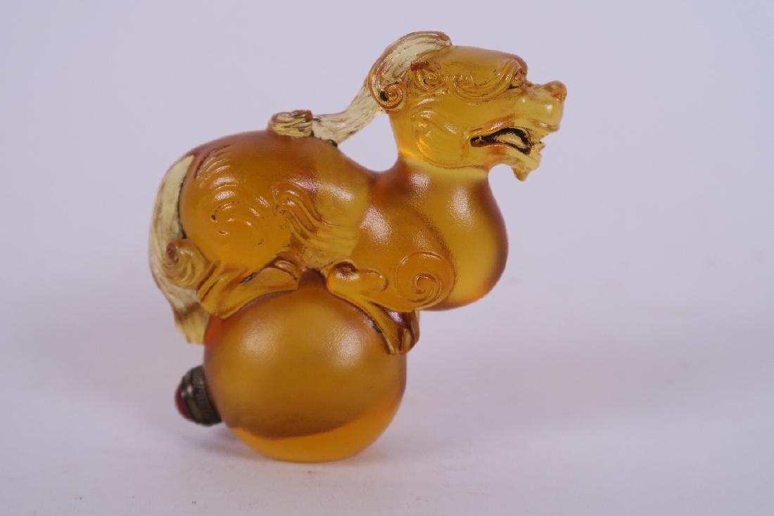 A Chinese yellow glass snuff bottle in the form of a (1 of 1)