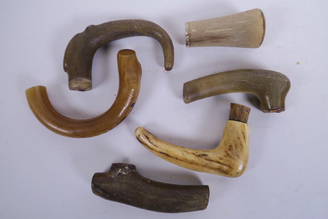 Six carved horn walking stick handles (1 of 1)