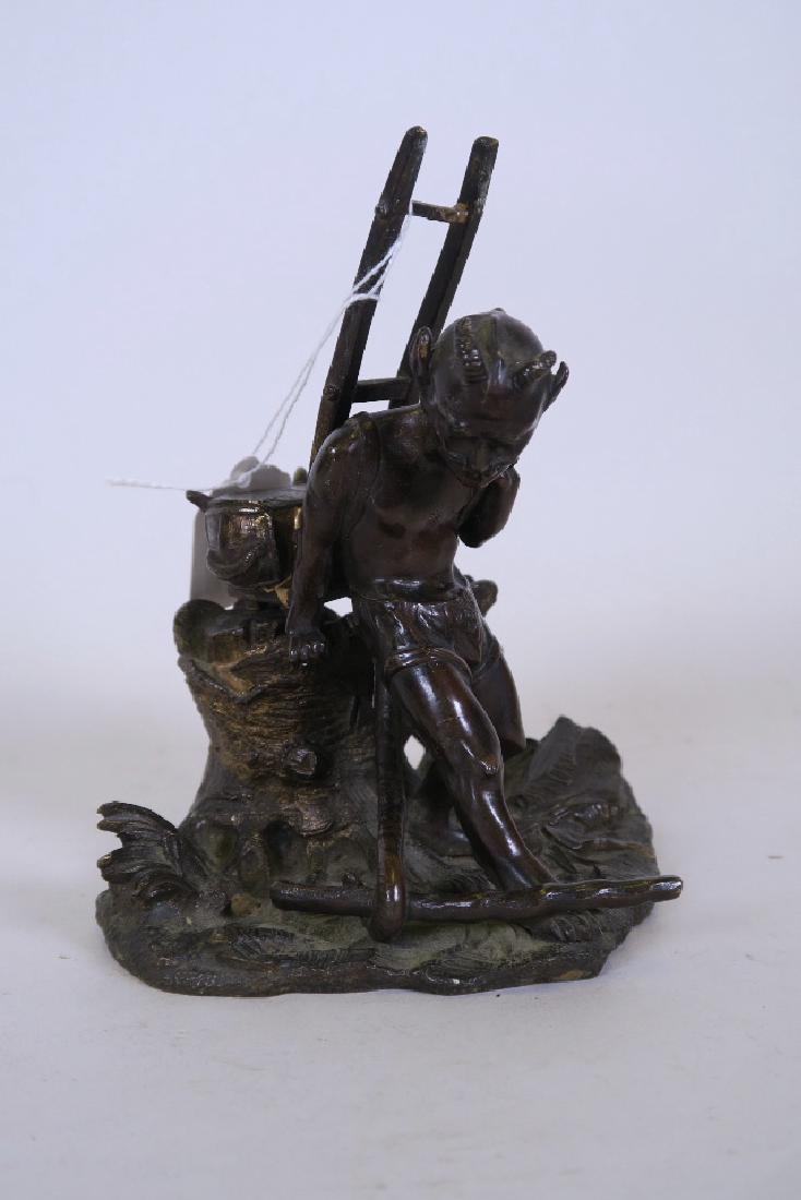 A Meiji bronze figure of a horned devil with rucksack, (1 of 3)