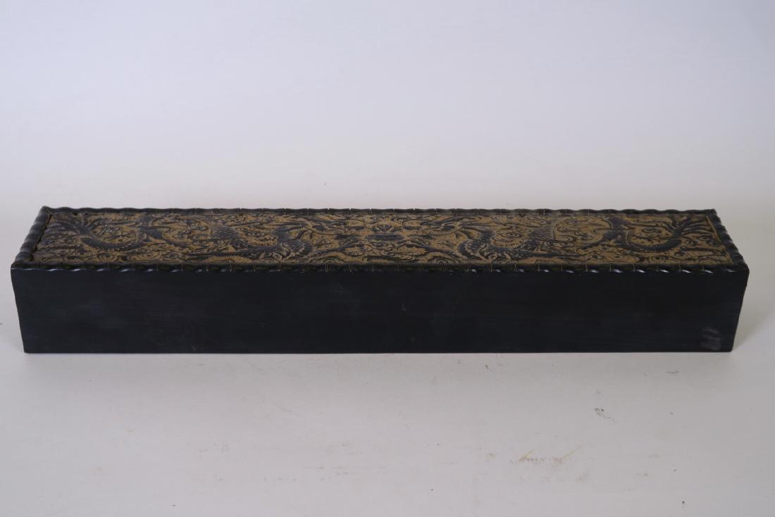 A Chinese black lacquer box with carved dragon and (1 of 3)
