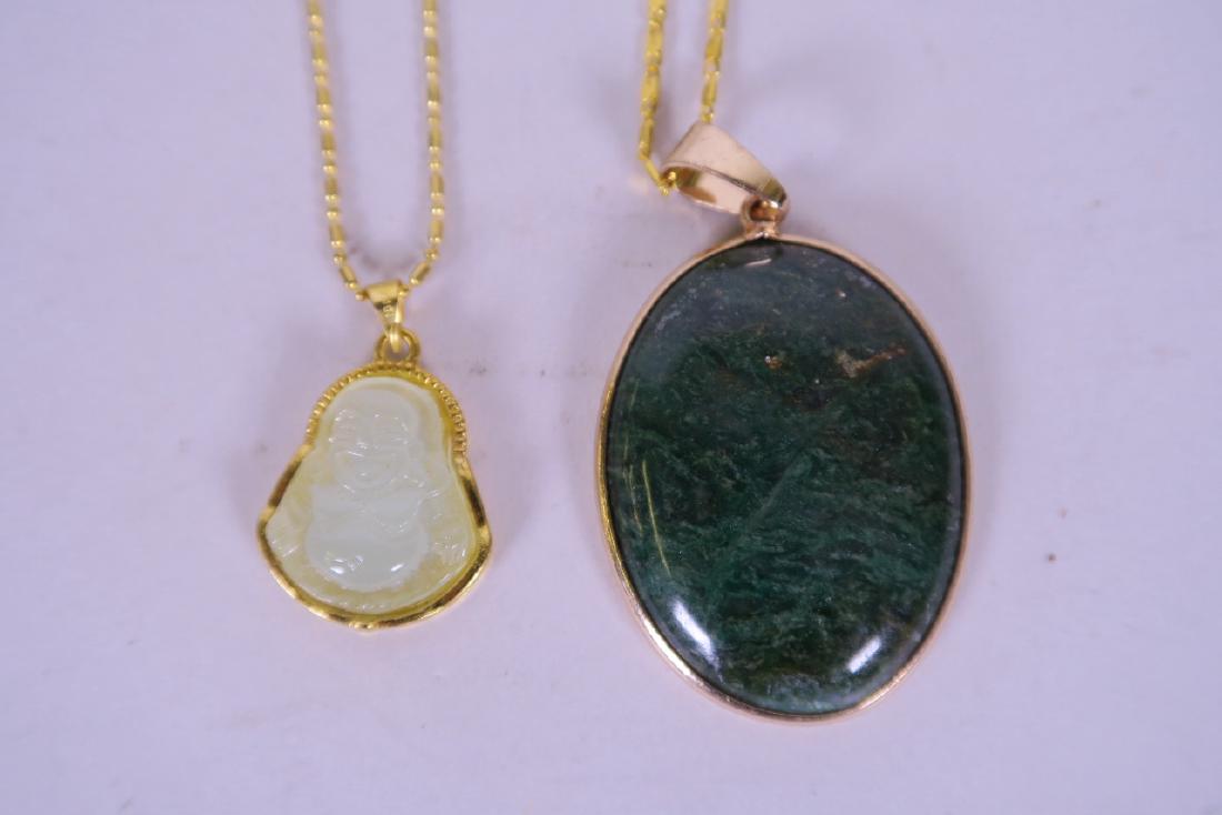 A Chinese green hardstone pendant carved in the form of (1 of 1)