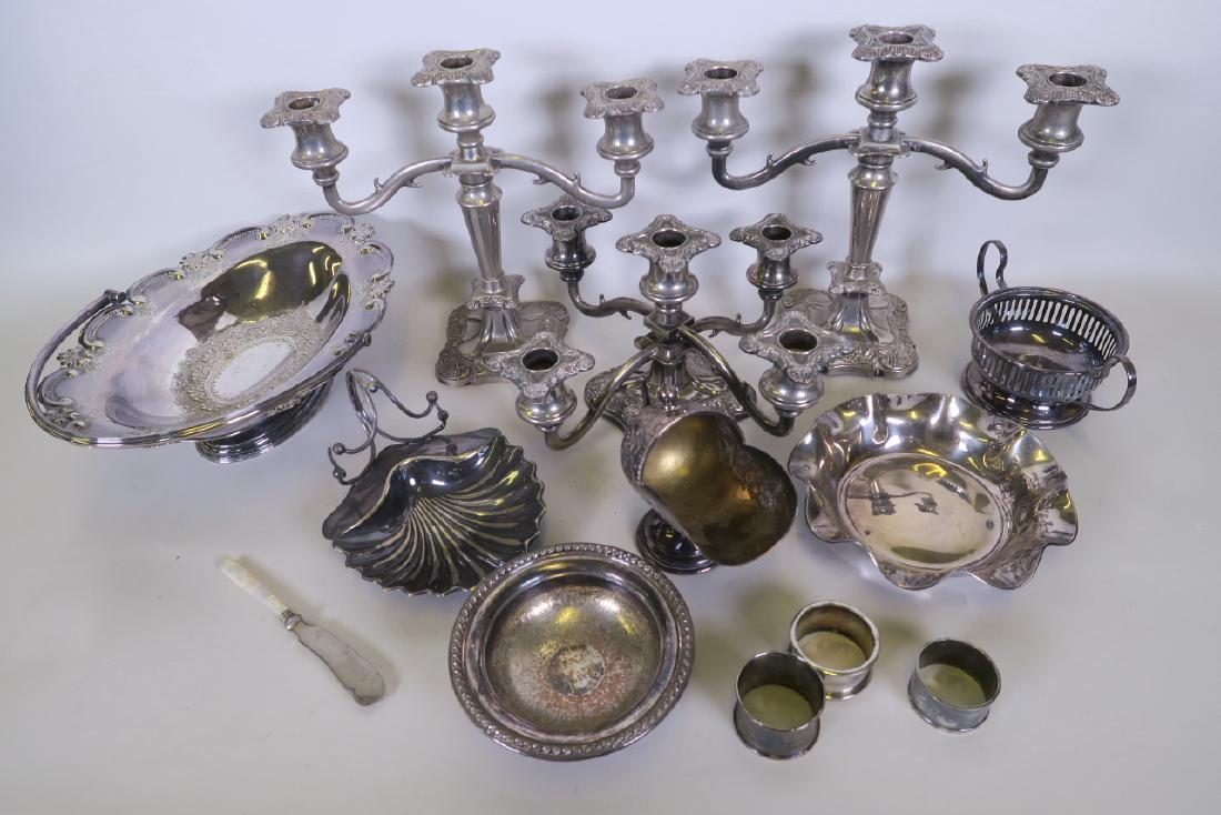 A quantity of silver plate including garniture of table: A quantity of silver plate including garniture of table candelabra comprising two three branch, and a matching squat five branch, 10" high