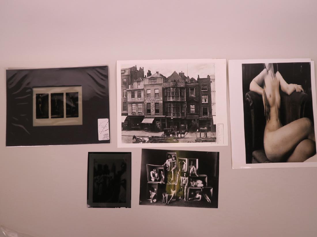 A collection of press prints to include 'Will McBride -: A collection of press prints to include 'Will McBride - My Sixties', 'Andre Kertesz - Distortion no. 6' and 'Sir Paul Pinder - Bishopsgate', together with two transparencies: 'William Klein - Street F