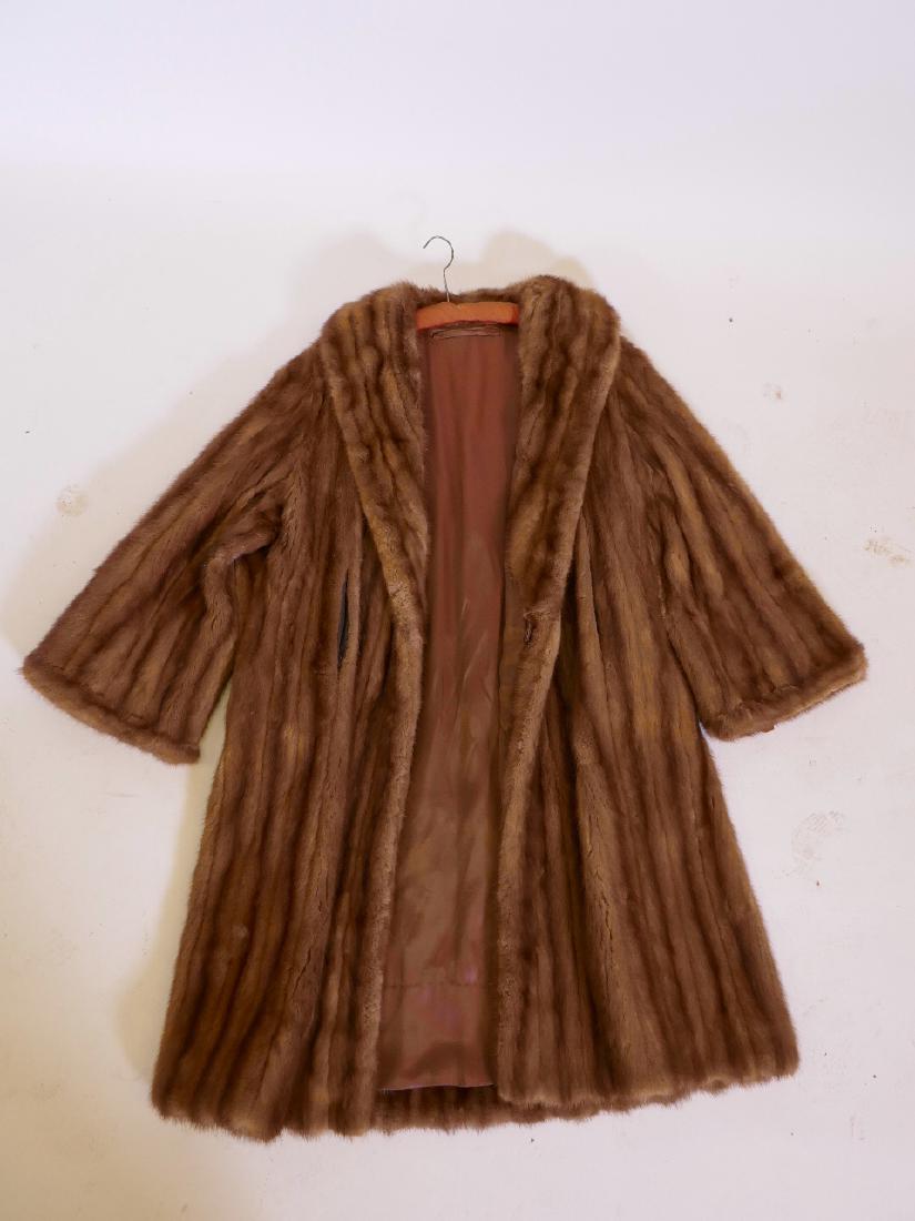 A good lady's vintage mink coat, monogrammed S.M. to: A good lady's vintage mink coat, monogrammed S.M. to lining, 43" long