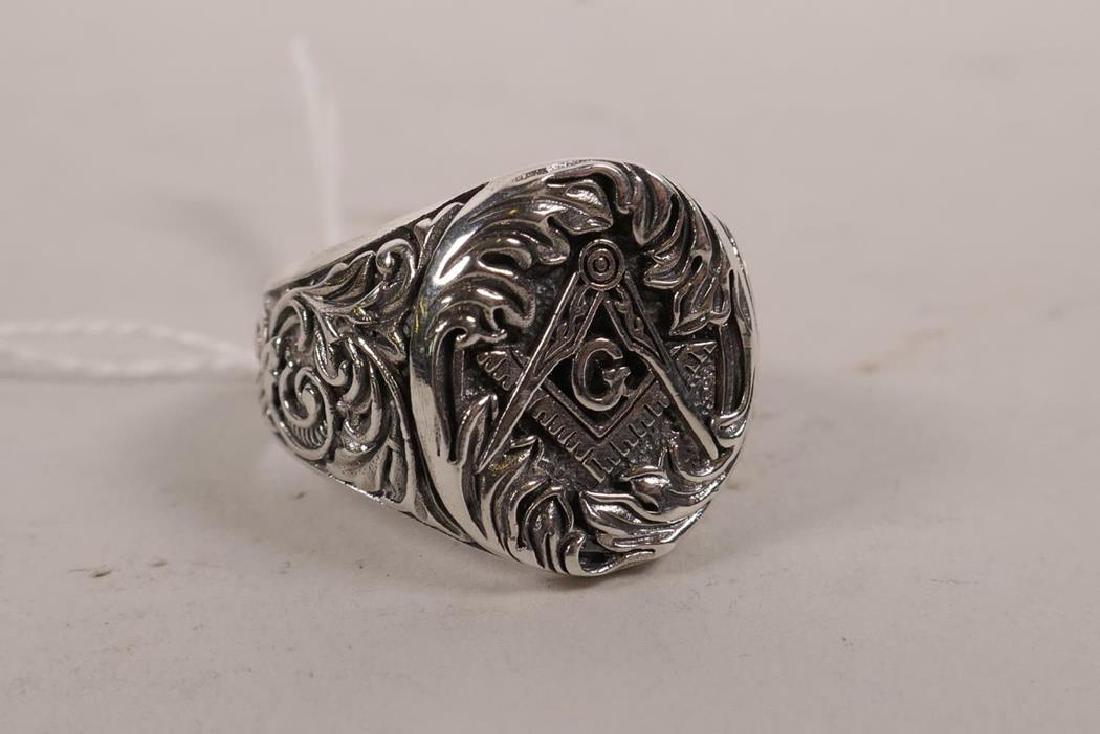 A 925 gentleman's silver ring with Masonic decoration,: A 925 gentleman's silver ring with Masonic decoration, approximate size 'W'