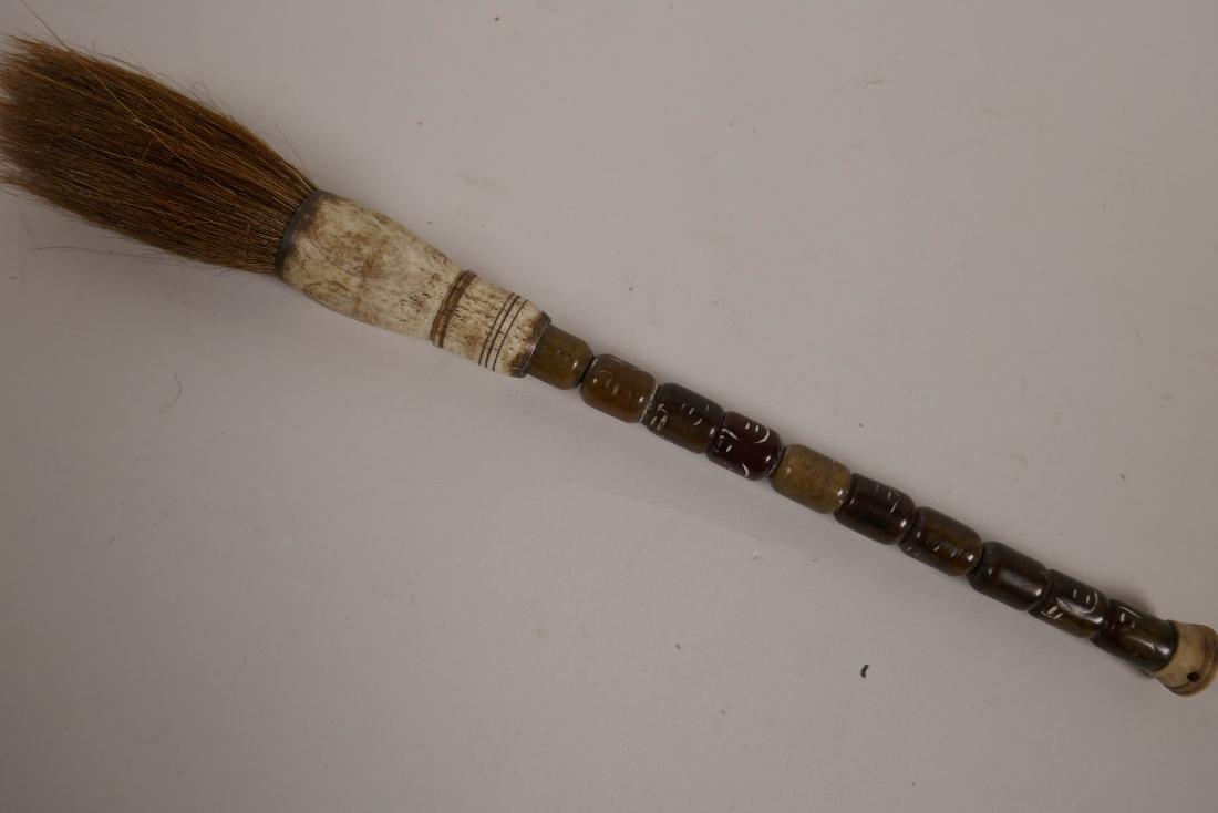 A Chinese agate and bone handled calligraphy brush, 10": A Chinese agate and bone handled calligraphy brush, 10" long