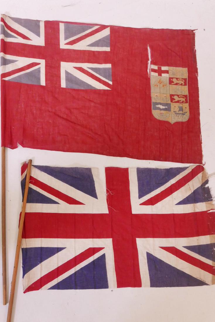 A rare Canadian red ensign, circa 1900, 27" x 20", A/F,: A rare Canadian red ensign, circa 1900, 27" x 20", A/F, and a Union Flag, 26" x 5½", A/F