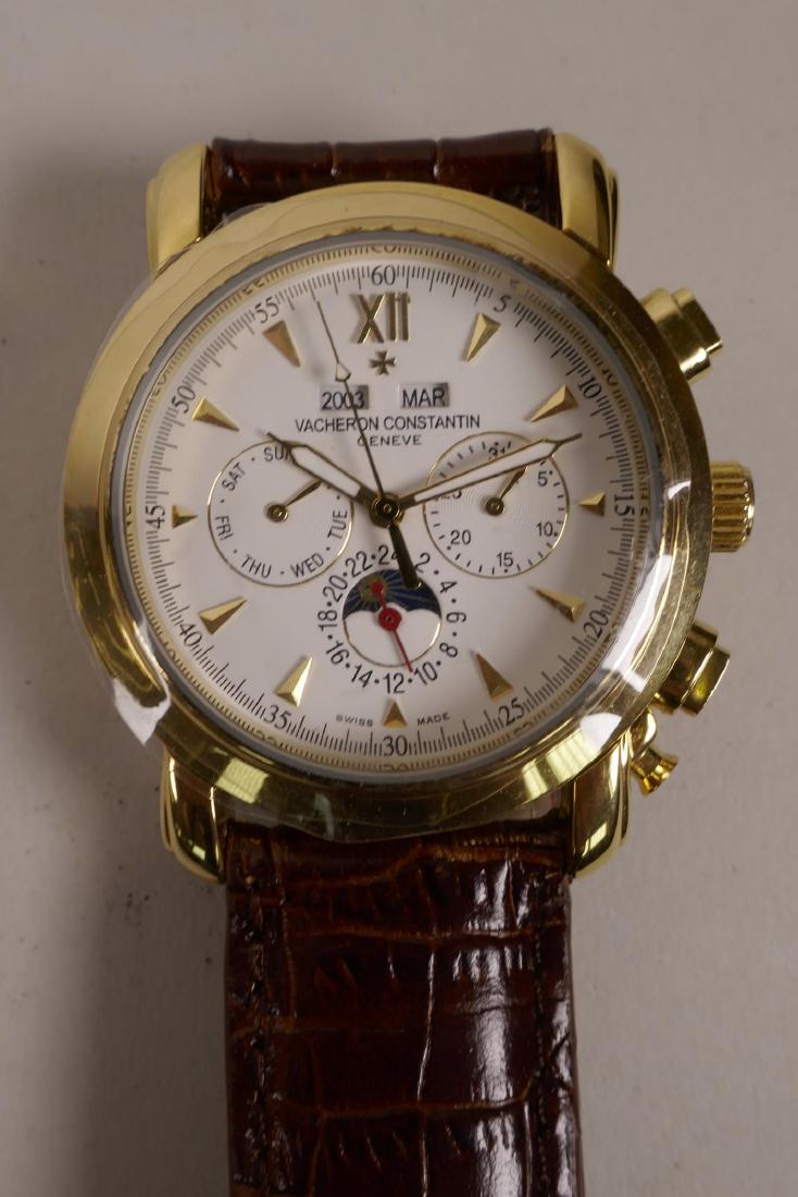 A gentleman's gold plated quartz wristwatch with three: A gentleman's gold plated quartz wristwatch with three subsidiary dials and moon phase aperture