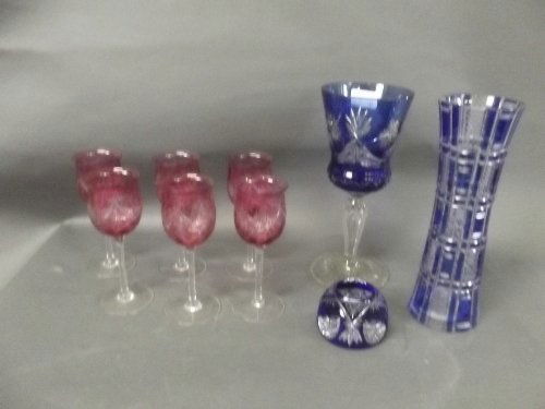 A Bohemian blue flash cut glass vase, 10¾'' high, a: A Bohemian blue flash cut glass vase, 10¾'' high, a Bohemian blue flash cut glass goblet, Bohemian paperweight, and a set of 6 early C20th etched ruby glasses