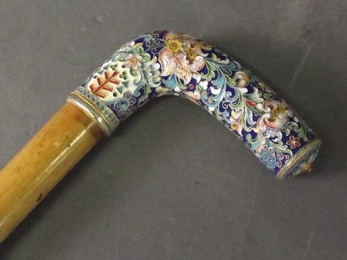 A Russian silver and enamel walking stick with flower: A Russian silver and enamel walking stick with flower decoration on a blue ground, 37'' long