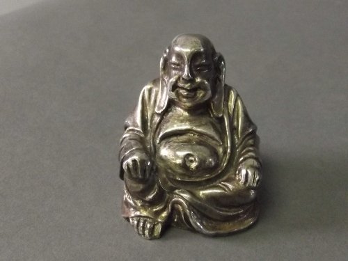 A Chinese silver Buddha, 2'' high: A Chinese silver Buddha, 2'' high