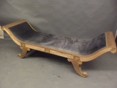 A gilt wood window seat of scroll form with carved: A gilt wood window seat of scroll form with carved decoration, 69'' wide, Best Bid