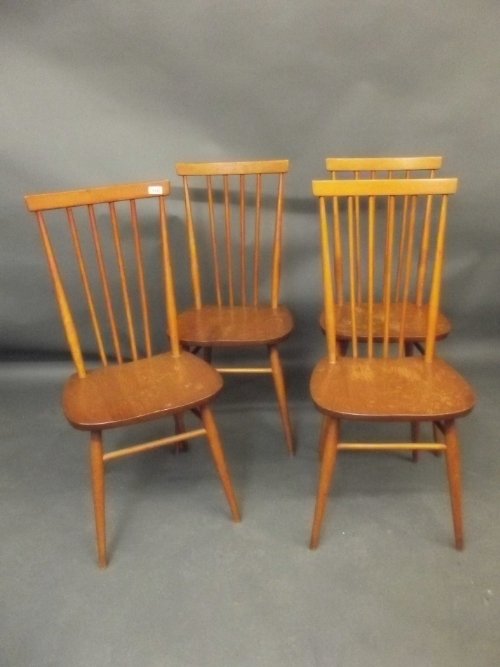 A set of 4 1960s Ercol beech and elm comb back dining c: A set of 4 1960s Ercol beech and elm comb back dining chairs